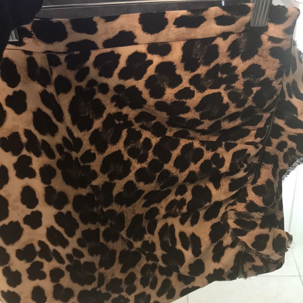 Ruched leopard mini skirt